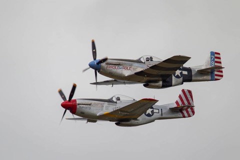 North American Aviation P-51 Mustang two aircraft in flight in United States Airforce markings