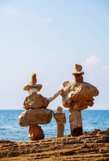 Stone figures on the beach