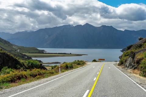 Road with views of mountains and Lake Hawea