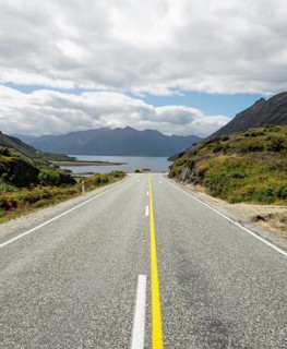 Road with views of mountains and Lake Hawea