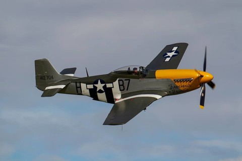 North American Aviation P-51 Mustang aircraft in flight in United States Airforce markings