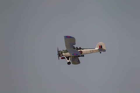 Fairey Swordfish aircraft in flight in Royal Navy markings