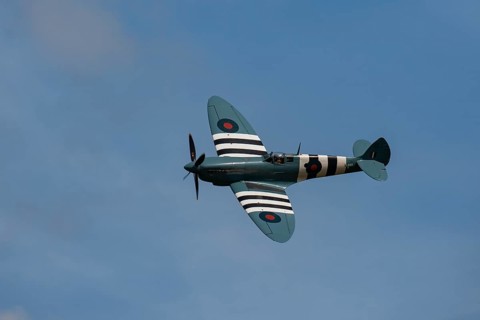Supermarine Spitfire aircraft in flight in Royal air force markings