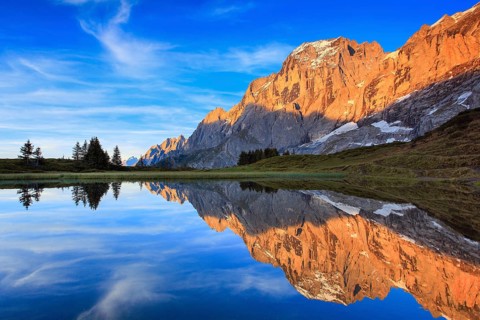 Wellhorn and Engelhoerner with mountain lake