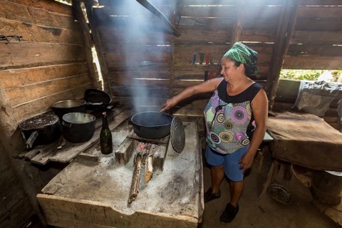 Farmer roasting coffee beans