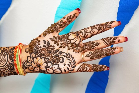 Henna tatoo on bride's hand on her the eve of her wedding date in Beau Bassin
