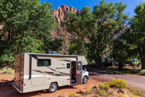 Motorhome in front of mountains at Watchman Campground