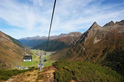Cable car Birkhahnbahn with Gorfenspitze and view of Galtuer