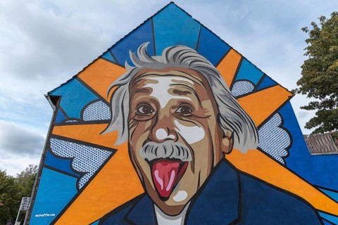 Graffiti by Albert Einstein on a house wall by the company lackaffen.de in Muenster