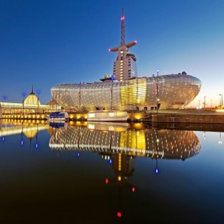 Illuminated Klimahaus Bremerhaven in the evening