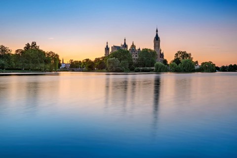 The Schwerin Castle at Lake Schwerin at sunset