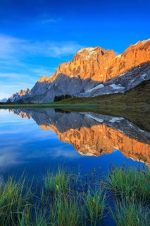 Wellhorn and Engelhoerner with mountain lake