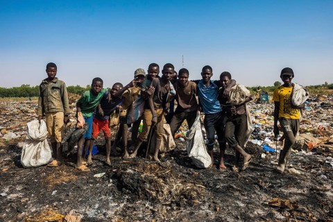 Local boys posing on a dump