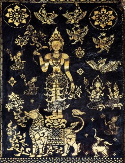 Decorated outer wall of the Sim prayer hall with gilded images of Apsaras