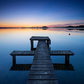 Wooden footbridge at the Schaalsee near Morgenrot