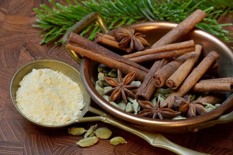 Christmas spices in bowl and powder in ladle
