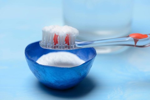 Sodium powder on toothbrush