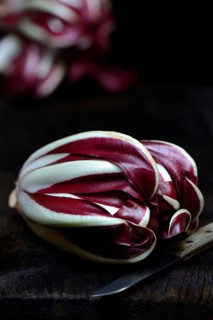 ( Cichorium intybus var. foliosum) Radicchio and kitchen knife, Radicchio Rosso di Treviso, red