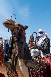 Colourful camel riders at a tribal festival