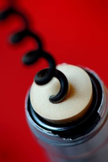 Corkscrew and wine bottle