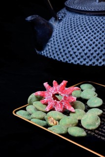 Wasabi peanuts and candied hibiscus flower