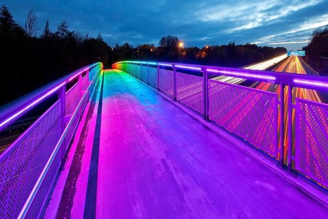 Rainbow bridge over the motorway A 40 in the evening