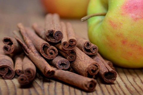 Cinnamon sticks and apple