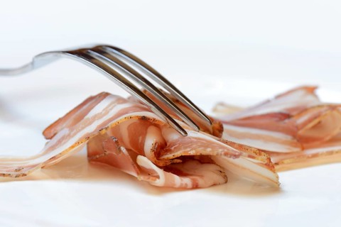 Bacon with fork
