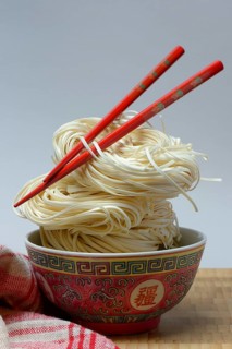 Chinese Yangchun noodles in bowl with chopsticks