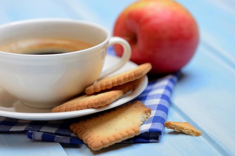 Butter biscuits and cup of coffee