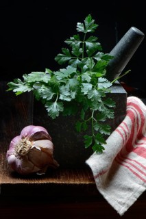 Smooth parsley in grated shell and garlic bulb