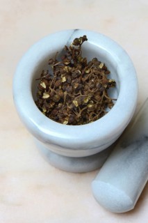 Wild Andaliman pepper in mortar