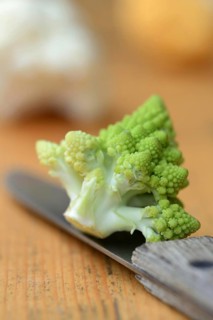 Romanesco cabbage with knife