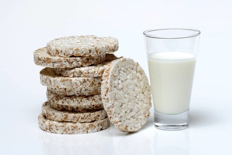 Stacked -waffles and glass of milk