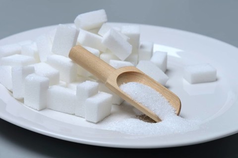 Sugar cubes on plate