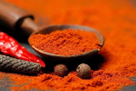 Powder in a wooden spoon