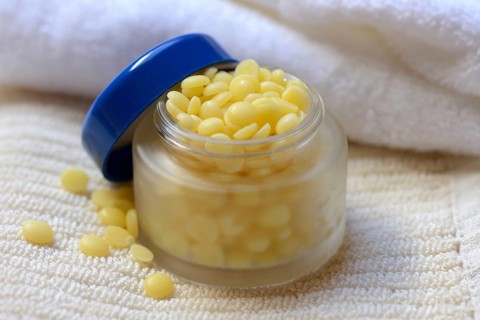 Cocoa butter in glass jar