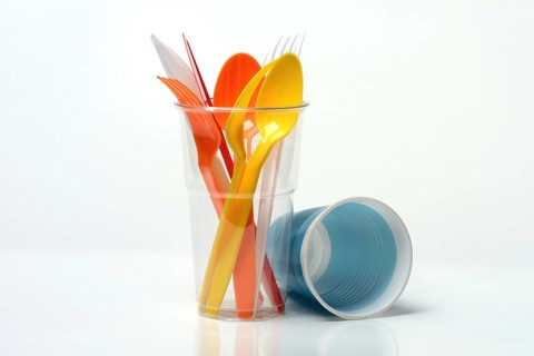 Plastic cups and plastic cutlery