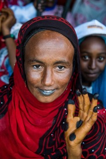 Colourful dressed toubou woman