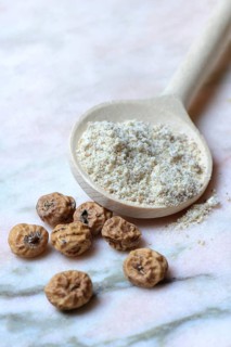 Tigernuts and tigernut flour in cooking spoon