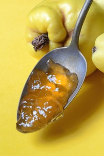 Quince jelly in spoon