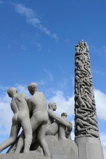 Monolith and human figures
