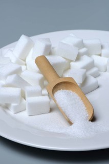 Sugar cubes on plate