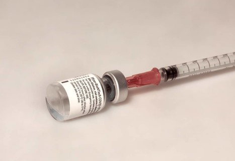 Vaccine Vial vs Covid 19 and Syringe