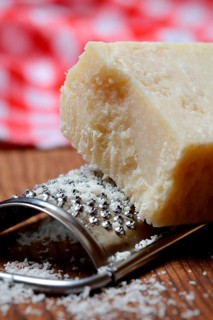 Parmesan cheese with grater