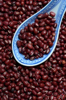 Dried azuki beans with porcelain spoon