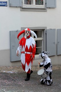 ( Basler Fasnacht) Carnivalist and child with drum, Basel, Switzerland, Europe