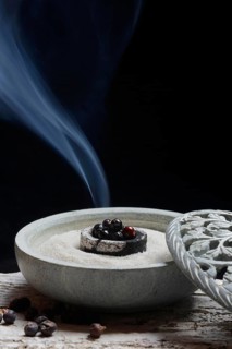 Burning juniper berries