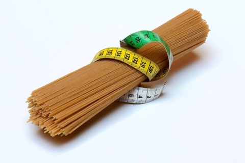 Spaghettis with measuring tape