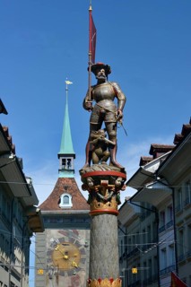 Fountain figure and time bell tower